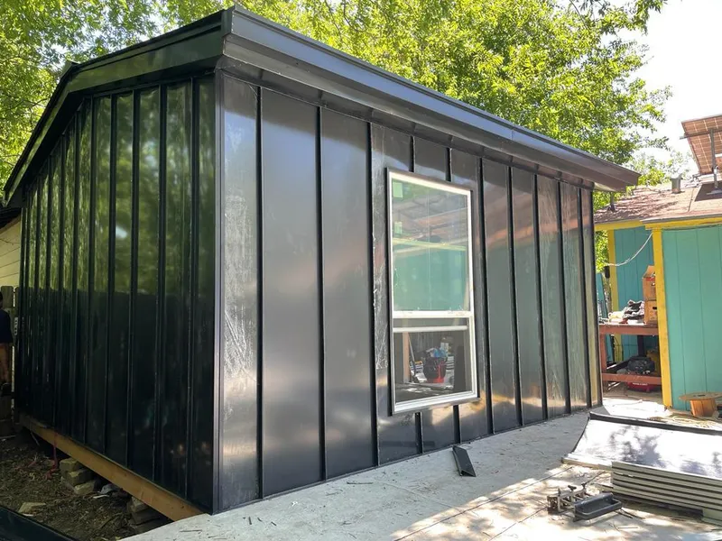 Black standing seam metal wall panels for Metal Roof Installation in Dacono