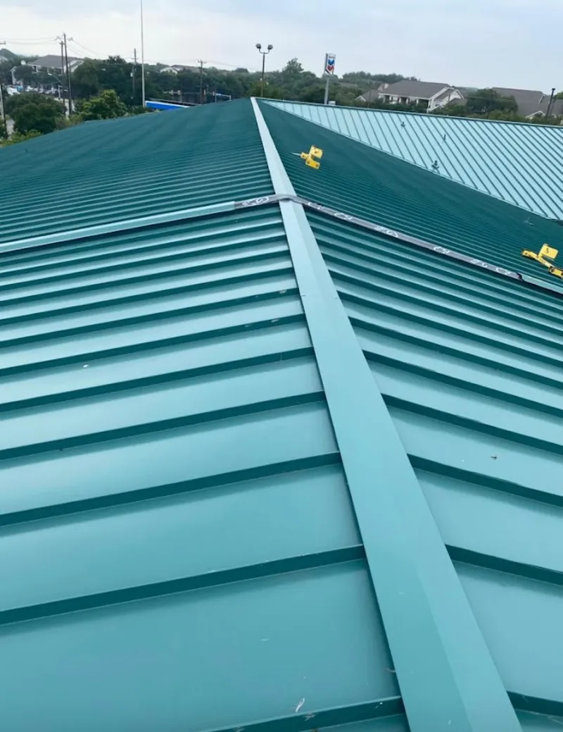 Green commercial metal roof ridge and valley for Metal Roof Repair in Dacono